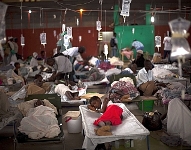 People suffering cholera symptoms are treated in a sports center converted into a cholera treatment center in Cap Haitien, Haiti, Tuesday Nov. 23, 2010. Haiti will hold elections on Nov. 28 in the midst of a month-old cholera epidemic that has killed at least 1,000 people and hospitalized thousands. (AP photo/Emilio Morenatti) Haiti Disease Outbreak