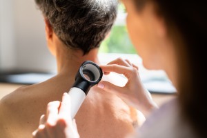 Dermatologist Checking Skin Allergy And Pigment Problems